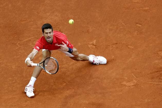 Serbian tennis player Novak Djokovic returns the ball to Scottish Andy Murray during their Mutua Madrid Open male final match played at the Caja Magica tennis complex in Madrid, Spain, on 08 May 2016. Novak Djokovic vs Andy Murray !ACHTUNG: NUR REDAKTIONELLE NUTZUNG!  20160508-635983395566440025
