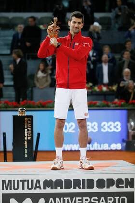 Serbian tennis player Novak Djokovic pose with the winner trophy after his victory 6-2, 3-6 and 6-3 against Scottish Andy Murray during their Mutua Madrid Open male final match played at the Caja Magica tennis complex in Madrid, Spain, on 08 May 2016. Novak Djokovic vs Andy Murray !ACHTUNG: NUR REDAKTIONELLE NUTZUNG!  20160508-635983405038604025