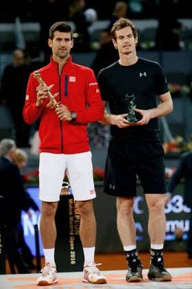 Serbian tennis player Novak Djokovic (L) poses with the winner trophy after his victory 6-2, 3-6 and 6-3 against Scottish Andy Murray (R) during their Mutua Madrid Open male final match played at the Caja Magica tennis complex in Madrid, Spain, on 08 May 2016. Novak Djokovic vs Andy Murray !ACHTUNG: NUR REDAKTIONELLE NUTZUNG!  20160508-635983405749808025