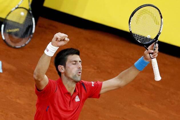 Serbian tennis player Novak Djokovic reacts after his victory 6-2, 3-6 and 6-3 against Scottish Andy Murray during their Mutua Madrid Open male final match played at the Caja Magica tennis complex in Madrid, Spain, on 08 May 2016. Novak Djokovic vs Andy Murray !ACHTUNG: NUR REDAKTIONELLE NUTZUNG!  20160508-635983407298888025