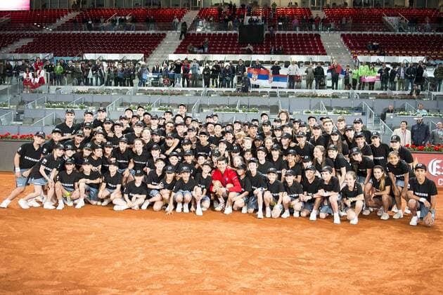 Serbian Novak Djokovic pose for the media with all the ball boys during TPA Finals Mutua Madrid Open Tennis 2016 in Madrid, May 08, 2016.  (20160508172)