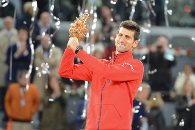 May 8, 2016 - Madrid, Spain - NOVAK DJOKOVIC poses with his trophy after winning the the Mutua Madrid Open. Tennis 2016 - Mutua Madrid Open - Day 9 - ZUMAl132