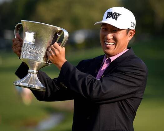 May 8, 2016 - Charlotte, NC, USA - James Hahn hoists the Wells Fargo Championship trophy after defeating Roberto Castro in the Wells Fargo Championship on Sunday, May 8, 2016, at Quail Hollow Club in Charlotte, N.C. Wells Fargo Championship - ZUMAm67_