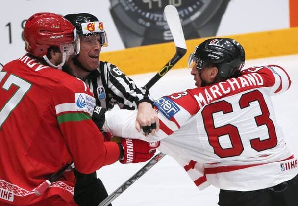 ST. PETERSBURG, RUSSIA. MAY 9, 2016. Belarus Alexander Kitarov (L) and Canada s Brad Marchand (R) fight in their 2016 IIHF World Championship WM Weltmeisterschaft Preliminary Round Group B Ice hockey Eishockey match at the Yubileyny Sports Palace. Sergei Savostyanov TASS  TS022346
