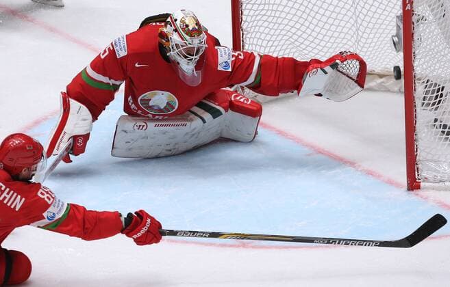 ST. PETERSBURG, RUSSIA. MAY 9, 2016. Belarus goalie Kevin Lalande (R) concedes a goal in their 2016 IIHF World Championship WM Weltmeisterschaft Preliminary Round Group B Ice hockey Eishockey match against Canada at the Yubileyny Sports Palace. Team Canada won the game 8-0. Sergei Savostyanov TASS  TS0223A3