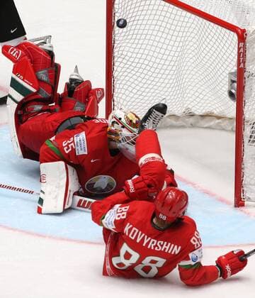 ST. PETERSBURG, RUSSIA. MAY 9, 2016. Belarus goalie Kevin Lalande (background) concedes a goal in their 2016 IIHF World Championship WM Weltmeisterschaft Preliminary Round Group B Ice hockey Eishockey match against Canada at the Yubileyny Sports Palace. Team Canada won the game 8-0. Sergei Savostyanov TASS  TS0223A4