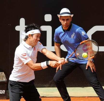 10.05.2016. Rome, Italy. BNL d Italia Tennis Tournament, Viktor Troicki (SRB) versus Kei Nishikori (JPN) Nishikori returns serve Nishikori won by 2-1 after being down a set. xactivaxfotox  ActionPlus11735441