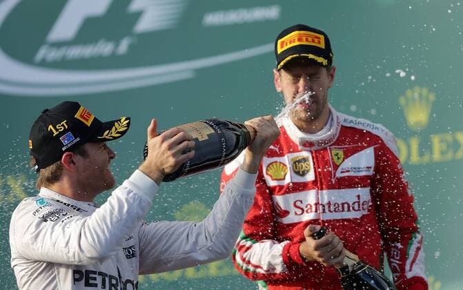 Sonntag, 20.03.2016, Formula 1 Rolex Australian Grand Prix, Saison 2015 2016, Podium: Sieger des Rennens Nico Rosberg (GER 6), Mercedes AMG Petronas Formula One Team, 3.Platz für Sebastian Vettel (GER 5), Scuderia Ferrari DeFodi506
