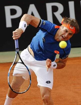 Italy: Tennis BNL Rome 2016 David Ferrer of Spain returns the ball during first round match of the Italian Open tennis BNL2016 tournament against Filippo Volandri of Italy at the Foro Italico.  CiroxDexLuca