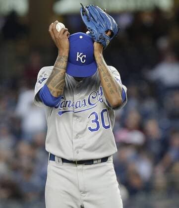 Kansas City Royals starting pitcher Yordano Ventura adjusted his hat in the 2nd inning against the New York Yankees at Yankee Stadium in New York City on May 11, 2016.  NYP20160511101 JOHNxANGELILLO