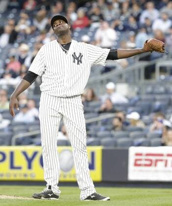 New York Yankees starting pitcher Michael Pineda reacts after Kansas City Royals Salvador Perez hits a 3-run home run in the first inning at Yankee Stadium in New York City on May 11, 2016.  NYP20160511110 JOHNxANGELILLO