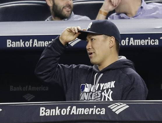 New York Yankees pitcher Masahiro Tanaka watches the 9th inning in the dug out against the Kansas City Royals at Yankee Stadium in New York City on May 11, 2016. The Royals defeated the Yankees 7-3.  NYP20160511120 JOHNxANGELILLO