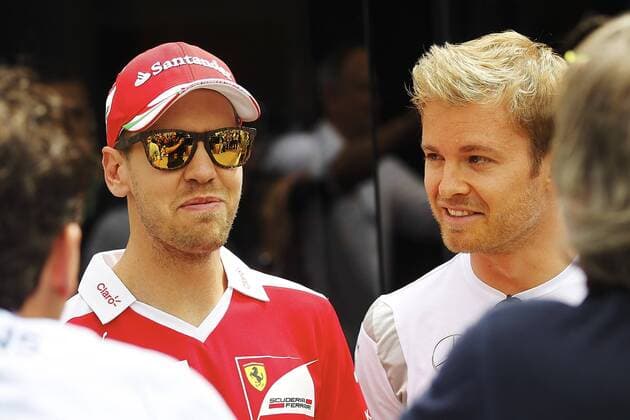 Formel 1, GP von Spanien German Formula One pilot Sebastian Vettel (L), of Ferrari, and countryman, Nico Rosberg of Mercedes, are seen at Circuit de Barcelona-Catalunya racetrack in Barcelona, northeastern Spain, 12 May 2016. Spanish Formula One Grand Prix will take place the upcoming 15 May. GRAND PRIX OF SPAIN !ACHTUNG: NUR REDAKTIONELLE NUTZUNG!  GRA157 20160512-635986713707277210