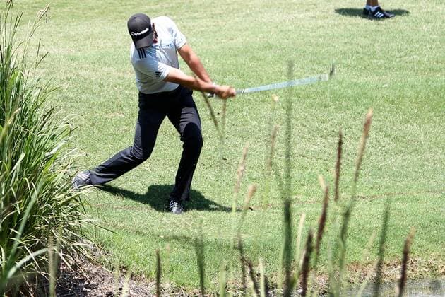 May 12, 2016 - Ponte Vedra Beach, Florida, United States - Jason Day hits out of a hazard area on the 7th hole during the first round of The PLAYERS Championship at TPC Sawgrass. The PLAYERS Championship - Round 1 - ZUMAw109