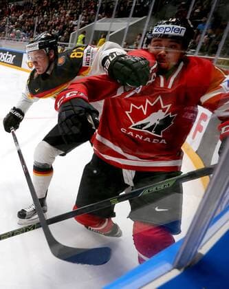 ST. PETERSBURG, RUSSIA. MAY 12, 2016. Germany s Sinan Akdag (L) and Canada s Matt Dumba in action in their 2016 IIHF World Championship WM Weltmeisterschaft Preliminary Round Group B Ice hockey Eishockey match at Yubileyny Sports Palace. Team Canada won the game 5:2. Alexander Demianchuk TASS  TS022B59