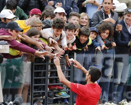 Italy: Tennis ATP Tennis Herren in Rome Novak Djokovic of Serbia celebrates after winning the quarter-final match of the Italian Open tennis BNL2016 tournament against Rafael Nadal of Spain at the Foro Italico in Rome.  CiroxdexLuca