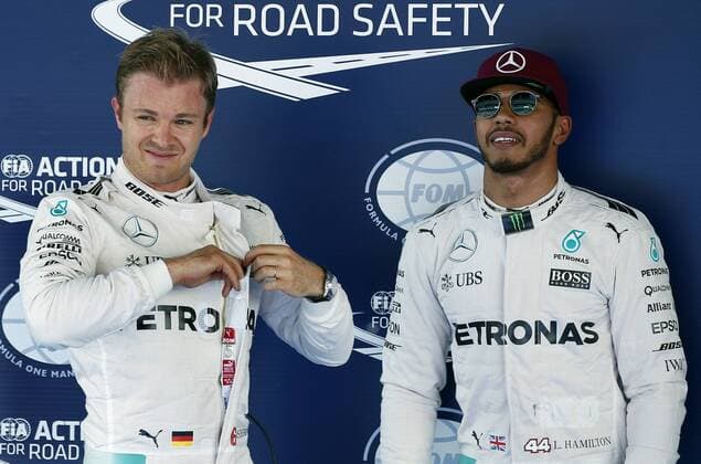 Formel 1, GP von Spanien, 3. Freies Training British Formula One driver Lewis Hamilton, of Mercedes, next to teammate, German Nico Rosberg (L, second), celebrates after winning the pole position in qualification session at the Barcelona-Catalunya circuit in Montmelo at Barcelona, Spain, on 14 May 2016. The Spanish Formula One Grand Prix will take place on 15 May 2016. SPANISH GRAND PRIX !ACHTUNG: NUR REDAKTIONELLE NUTZUNG!  GRA192 20160514-635988378377592552