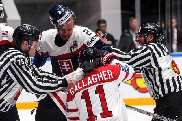ST. PETERSBURG, RUSSIA. MAY 14, 2016. Slovakia s Andrej Sekera (C background) and Canada s Brendan Gallagher (front) fight in their 2016 IIHF World Championship WM Weltmeisterschaft Preliminary Round Group B Ice hockey Eishockey match at the Yubileyny Sports Palace. Team Canada won the game 5-0. Sergei Savostyanov TASS  TS022FE6