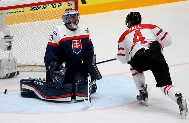 ST. PETERSBURG, RUSSIA. MAY 14, 2016. Slovakia s goalie Julius Hudacek (L) concedes a goal in their 2016 IIHF World Championship WM Weltmeisterschaft Preliminary Round Group B Ice hockey Eishockey match against Canada at the Yubileyny Sports Palace. Team Canada won the game 5-0. Alexander Demianchuk TASS  TS022FBC