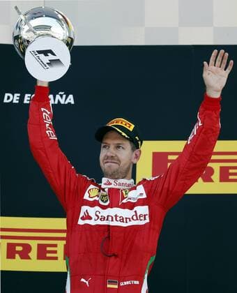 German Formula One driver Sebastian Vettel, Ferrari, celebrates his third place at the Spanish Formula One Grand Prix at the Barcelona-Catalunya circuit in Barcelona, northeastern Spain, on 15 May 2016. SPANISH GRAND PRIX !ACHTUNG: NUR REDAKTIONELLE NUTZUNG!  20160515-635989304888347616