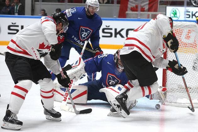 ST. PETERSBURG, RUSSIA. MAY 16, 2016. Canada s Brad Marchand, Ryan O Reilly (L-R front), France s Benjamin Dieude Fauvel, France s goalie Ronan Quemener (L-R background) in action in their 2016 IIHF World Championship WM Weltmeisterschaft Preliminary Round Group B Ice hockey Eishockey match at Yubileyny Sports Palace. Sergei Savostyanov TASS  TS023355