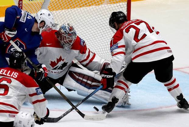 ST. PETERSBURG, RUSSIA. MAY 16, 2016. France s Tim Bozon, Canada s goalie Calvin Pickard and Canada s Ryan Murray (L-R) in action in their 2016 IIHF World Championship WM Weltmeisterschaft Preliminary Round Group B Ice hockey Eishockey match at Yubileyny Sports Palace. The Canadian Team won the game 4:0. Alexander Demianchuk TASS  TS0233EE