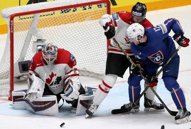 ST. PETERSBURG, RUSSIA. MAY 16, 2016. France s Valentin Claireaux (R), Canada s goalie Calvin Pickard and Canada s Michael Matheson (L-R) in action in their 2016 IIHF World Championship WM Weltmeisterschaft Preliminary Round Group B Ice hockey Eishockey match at Yubileyny Sports Palace. The Canadian Team won the game 4:0. Alexander Demianchuk TASS  TS0233EF