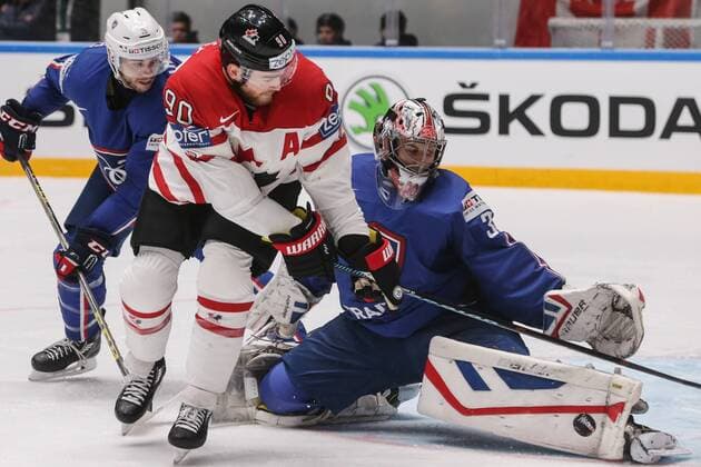 ST. PETERSBURG, RUSSIA. MAY 16, 2016. France s Benjamin Dieude Fauvel, Canada s Ryan O Reilly and France s goalie Ronan Quemener (L-R) in action in their 2016 IIHF World Championship WM Weltmeisterschaft Preliminary Round Group B Ice hockey Eishockey match at Yubileyny Sports Palace. The Canadian Team won the game 4:0. Sergei Savostyanov TASS  TS023404