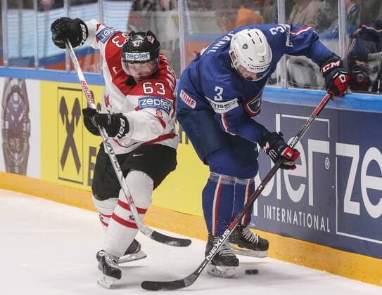 ST. PETERSBURG, RUSSIA. MAY 16, 2016. Canada s Brad Marchand (L) and France s Jonathan Janil fight for the puck in their 2016 IIHF World Championship WM Weltmeisterschaft Preliminary Round Group B Ice hockey Eishockey match at Yubileyny Sports Palace. The Canadian Team won the game 4:0. Sergei Savostyanov TASS  TS02340C