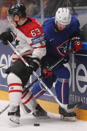 ST. PETERSBURG, RUSSIA. MAY 16, 2016. Canada s Brad Marchand (L) and France s Jonathan Janil fight for the puck in their 2016 IIHF World Championship WM Weltmeisterschaft Preliminary Round Group B Ice hockey Eishockey match at Yubileyny Sports Palace. The Canadian Team won the game 4:0. Sergei Savostyanov TASS  TS02340D