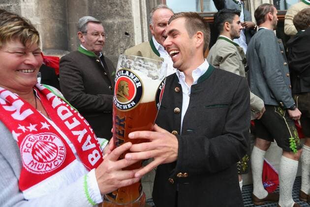 MUNICH, GERMANY - MAY 15: Karin Danner, team manager of Bayern Muenchen women s team and Philipp Lahm of Bayern Muenchen celebrates winning the German Championship title on the town hall balcony at Marienplatz on May 15, 2016 in Munich, Germany. Karin Danner; Philipp Lahm Muenchen Copyright: FCB POOL EIBNER-PRESSEFOTO EP_POOL