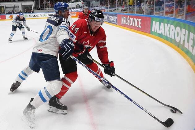 Eishockey, WM, Finnland - Kanada Finland s Jarno Koskiranta and Canada s Morgan Rielly (L-R front) fight for the puck in their 2016 IIHF World Championship WM Weltmeisterschaft Preliminary Round Group B Ice hockey Eishockey match at Yubileyny Sports Palace in St. Petersburg, Russia, May 17, 2016. Sergei Savostyanov TASS  TS02371E