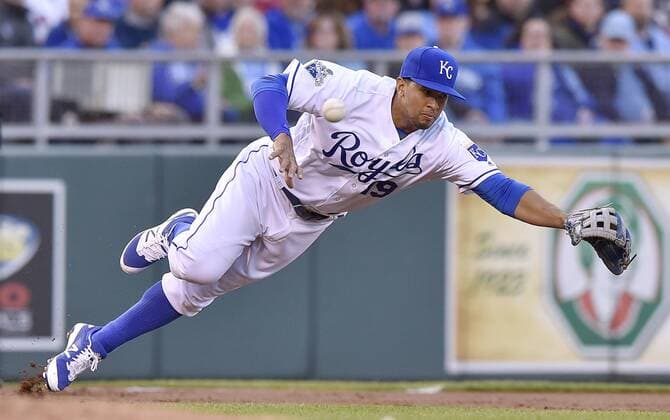May 17, 2016 - Kansas City, MO, USA - Kansas City Royals third baseman Cheslor Cuthbert cadn t reach a single by the Boston Red Sox s Mookie Betts on Tuesday, May 17, 2016, at Kauffman Stadium in Kansas City, Mo. Boston at Kansas City - ZUMAm67_