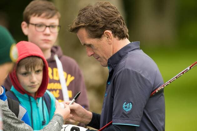 17.05.2016. The K Club, Straffan, Co. Kildare, Ireland. Dubai Duty Free Irish Open Golf Championship Pro-AM. AP McCoy signs autographs for some young fans. xPeterxFitzpatrickx  ActionPlus11738363