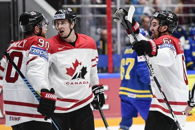 160519 Kanadas Ryan OÕReilly och Ryan Murray jublar med Mark Scheifele (m) efter att han gjort 1-0 under kvartsfinalen i Ishockey-VM mellan Kanada och Sverige den 19 maj 2016 i St Petersburg.  Copyright: LUDVIGxTHUNMAN BB160519LT065