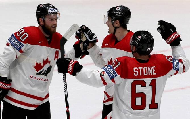 Canada s Ryan O Reilly, Mark Scheifele, and Mark Stone (L-R) celebrate scoring in their 2016 IIHF World Championship WM Weltmeisterschaft quarter-final Ice hockey Eishockey match against Sweden at the Yubileyny Sports Palace in St. Petersburg, Russia, May 19, 2016. Alexander Deminachuk TASS  TS023C3B
