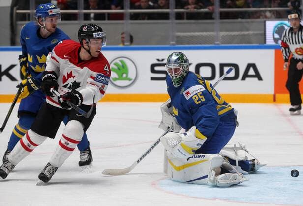 Canada s Taylor Hall (L) attacks Sweden s goaltender Jacob Markstrom in their 2016 IIHF World Championship WM Weltmeisterschaft quarter-final Ice hockey Eishockey match at the Yubileyny Sports Palace in St. Petersburg, Russia, May 19, 2016. Sergei Savostyanov TASS  TS023C6B