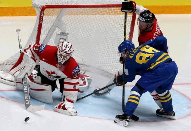 Canada s goaltender Cam Talbot, Michael Matheson defend against Sweden s linus Klasen in their 2016 IIHF World Championship WM Weltmeisterschaft quarter-final Ice hockey Eishockey match at the Yubileyny Sports Palace in St. Petersburg, Russia, May 19, 2016. Alexander Demianchuk TASS  TS023C80