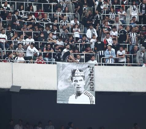 Besiktas players arrive at their stadium during celebrations after their team won the Turkish Super Toto league football match between Besiktas and Osmanlispor at the Vodafone Arena Stadium in Istanbul on May 19, 2016. .Istanbul side Besiktas on May 15 clinched the Turkish Super Lig title with a game to spare, topping the league for the first time since 2009 and claiming Turkey s sole automatic Champions League spot. Besiktas won the match 3-1. Pictured : Mario Gomez 