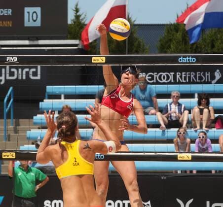 May 19, 2016 - Cincinnati, Ohio, U.S - U.S.A . April Ross hits over Germany Teresa Mermann on Thu May 19, 2016. During play in the AVP FIVB Cincinnati Open in Cincinnati,Ohio during play in a sand Beach volleyball Beachvolleyball event AVP FiVB Beach Volleyball Cincinnati Open - ZUMAc199