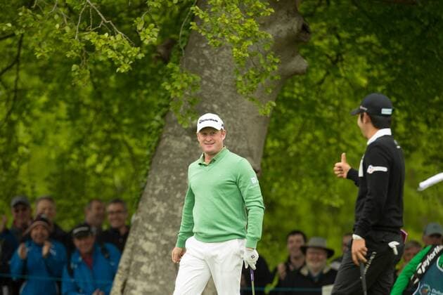 20.05.2016. The K Club, Straffan, Co. Kildare, Ireland. Dubai Duty Free Irish Open Golf Championship Round 2. Jamie Donaldson gets the thumbs up from Soomin Lee for his chip-in birdie on the 6th green. xPeterxFitzpatrickx  ActionPlus11739046