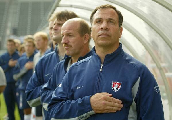 Jan. 1, 2011 - Scarborough, North Yorkshire, England - USA V DENMARK, friendly. Carson, Los Angeles, USA 18 1 4..US head coach BRUCE ARENA and his bench during the US national anthem. - ZUMAg49_