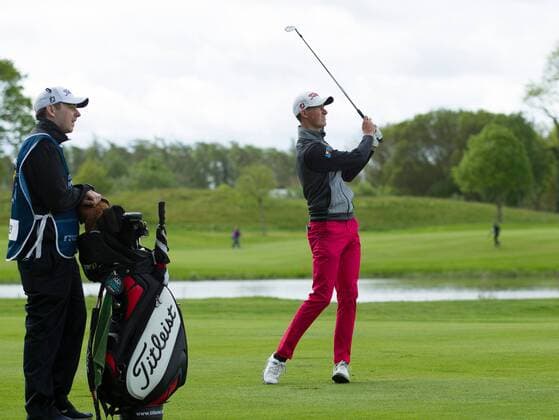 21.05.2016. The K Club, Straffan, Co. Kildare, Ireland. Dubai Duty Free Irish Open Golf Championship Round 3. Gary Hurley takes his second shot on the 1st hole. xPeterxFitzpatrickx  ActionPlus11739630