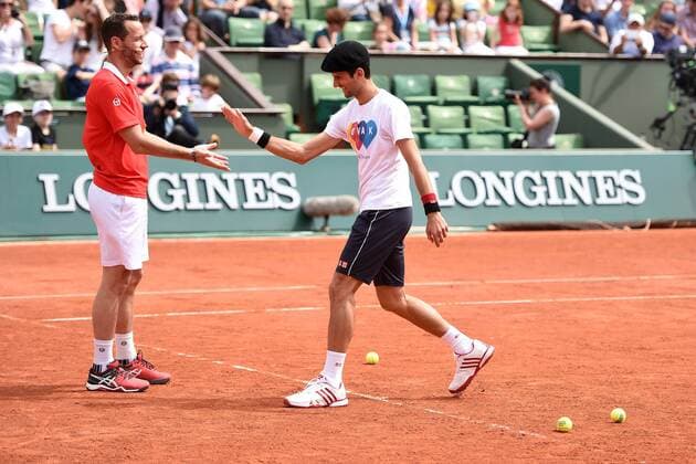 Michael Llodra (FRA) Novak Djokovic (SRB) TENNIS : Roland Garros 2016 - French Open - 21 05 2016 TennisMagazine 