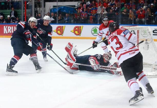 US Miles Wood, Jake McCabe, US goalie Keith Kinkaid (L-R) and Canada s Brad Marchand (R front), Cody Ceci (R background) in action in their 2016 IIHF World Championship WM Weltmeisterschaft semifinal Ice hockey Eishockey match at VTB Ice Palace in Moscow, Russia, May 21, 2016. Sergei Fadeichev TASS  TS023FA3