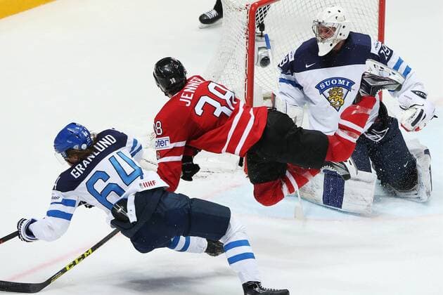 Finland s Mikael Granlund (L), Finland s goalie Mikko Koskinen (R) and Canada s Boone Jenner (C) in action in their 2016 IIHF World Championship WM Weltmeisterschaft final Ice hockey Eishockey match at VTB Ice Palace in Moscow, Russia, May 22, 2016. Artyom Korotayev TASS  TS0241D6