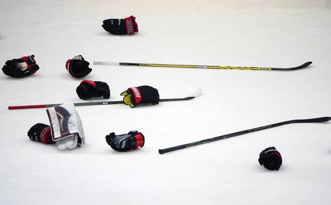 Ice hockey Eishockey sticks and gloves of Canada s players after the 2016 IIHF World Championship WM Weltmeisterschaft final ice hockey match between Finland and Canada at VTB Ice Palace in Moscow, Russia, May 22, 2016. The Canadian team won the game 2:0. Artyom Korotayev TASS  TS0241F6