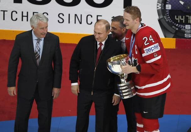 .The Final of Ice hockey Eishockey World Championship WM Weltmeisterschaft 2016.Canada-Finland.Russian President Vladimir Putin and President of IIHF Rene Fazel with captain of Canada team Perry with trophy .