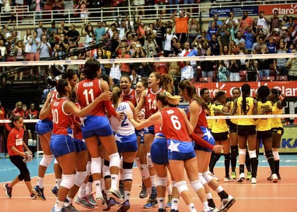 Puerto Rican players (C) celebrate after defeating Kenya in their2016 Women volleyball s Olympic Qualifying Tournament s match at Coliseo Roberto Clemente pavilion in San Juan, Puerto Rico, on 22 May 2016. Puerto Rico qualified for Rio Olympic Games Olympische Spiele Olympia OS for the first time ever after defeating Kenya 25-8, 25-23, 25-15. Puerto Rican women s volleyball team qualifies for Rio Olympic Games for the first time ever !ACHTUNG: NUR REDAKTIONELLE NUTZUNG!  20160523-635995905973370132