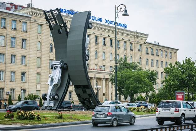 Baku: A silver car advertises A silver car advertises the first Baku Grand Prix.  AzizxKarimov